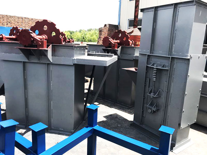 板鏈斗式提升機底部積料漏粉現場改造方案圖解